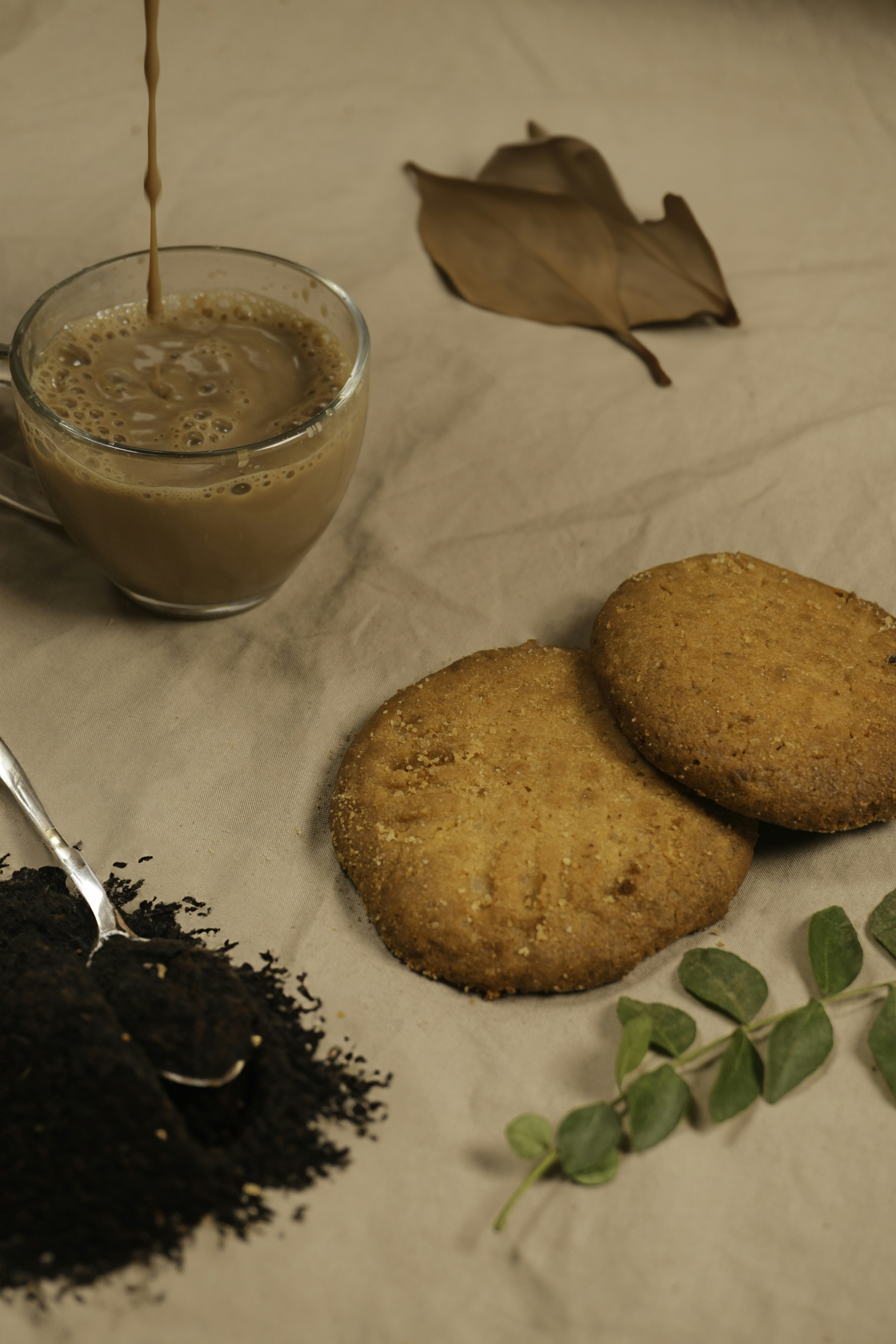 a table topped with cookies and a cup of coffee