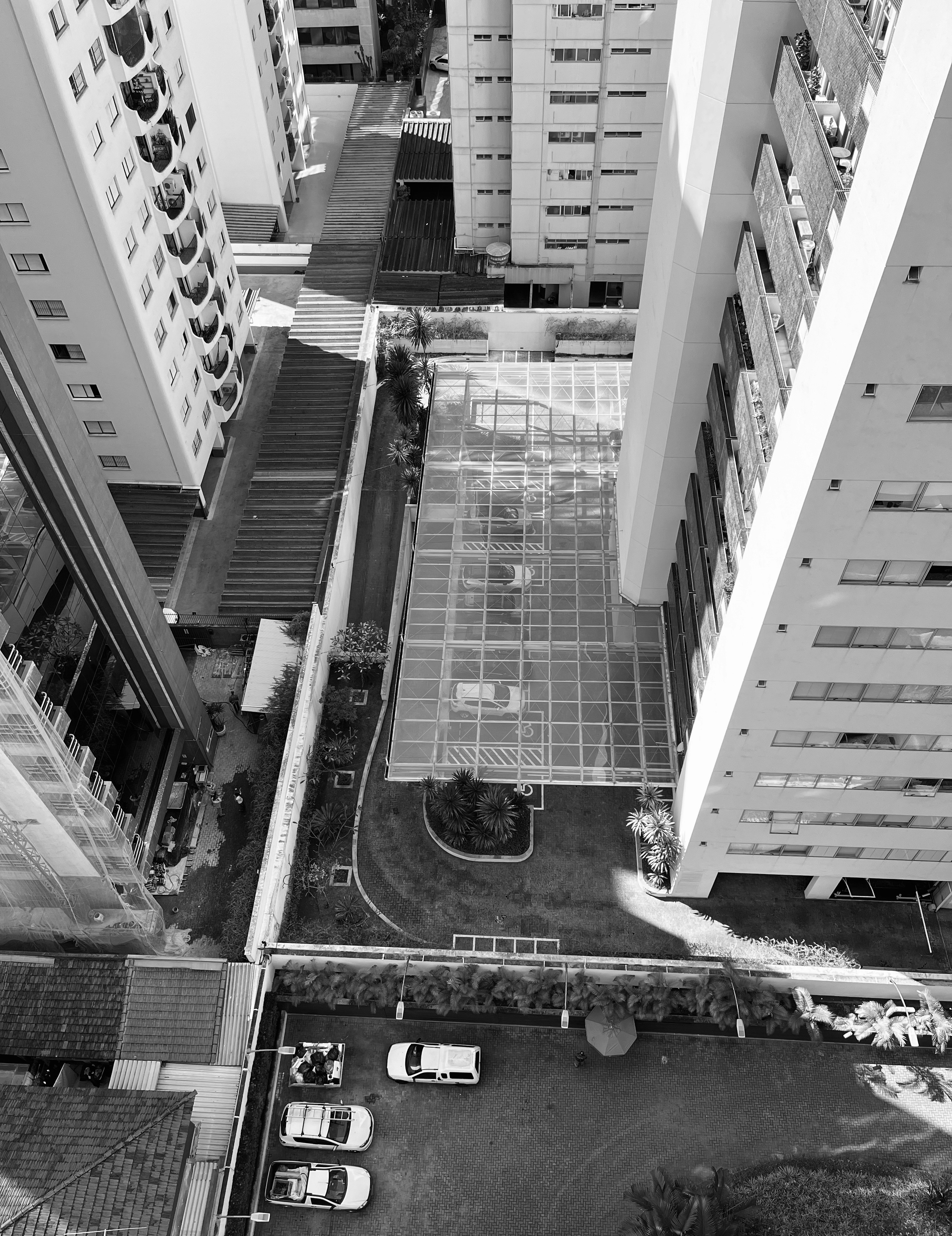 an aerial view of a parking lot in a city