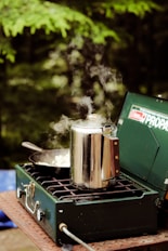 a stove with a pot on top of it