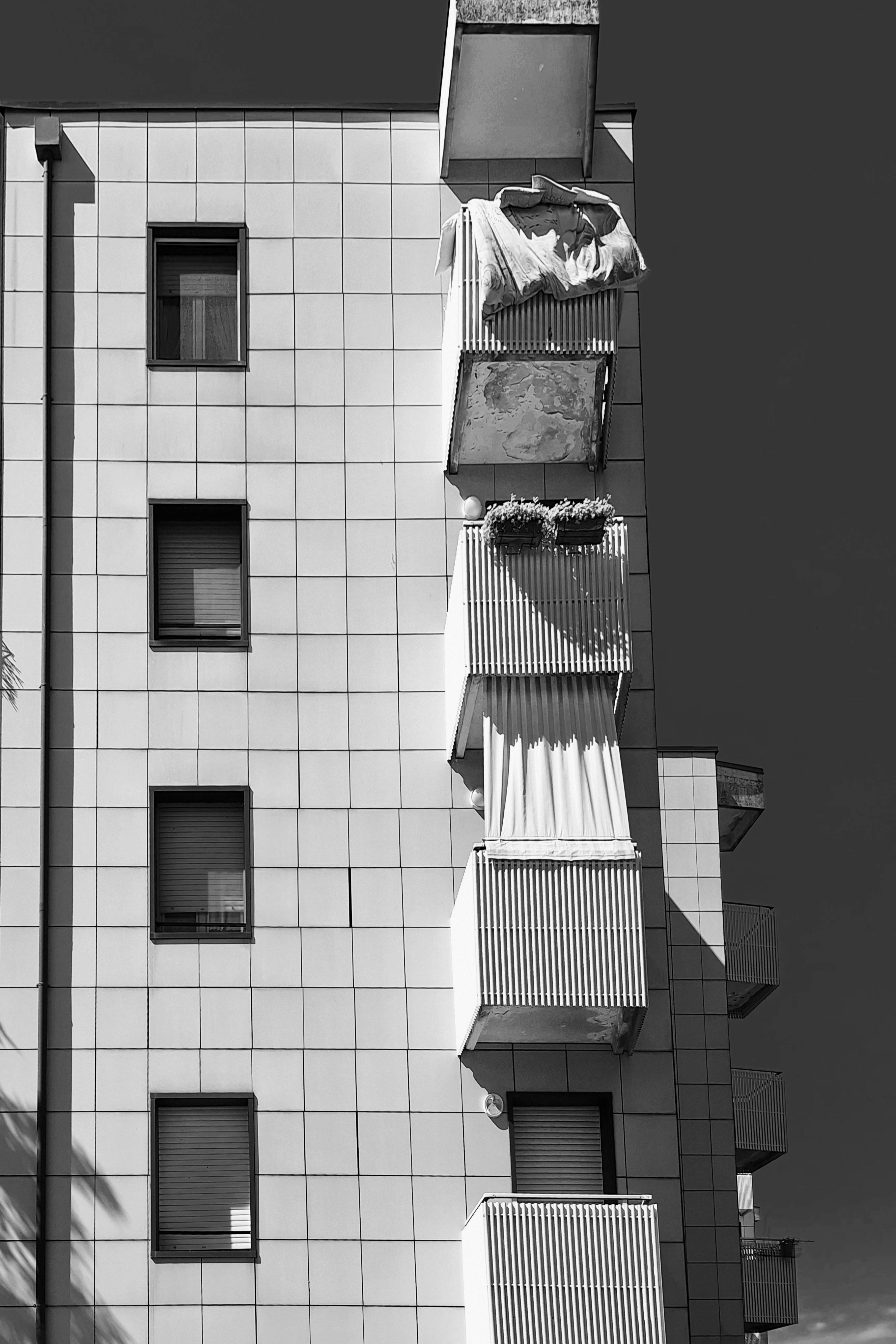 a black and white photo of a tall building