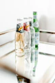 a row of empty bottles sitting on top of a table