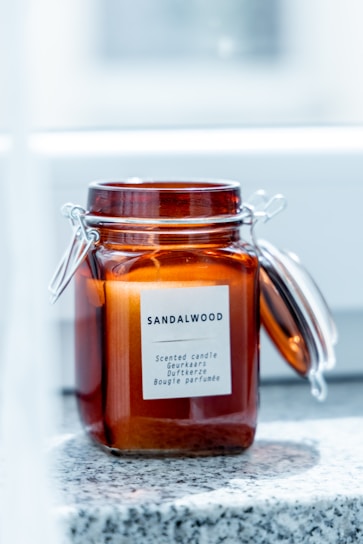 a jar filled with liquid sitting on top of a counter