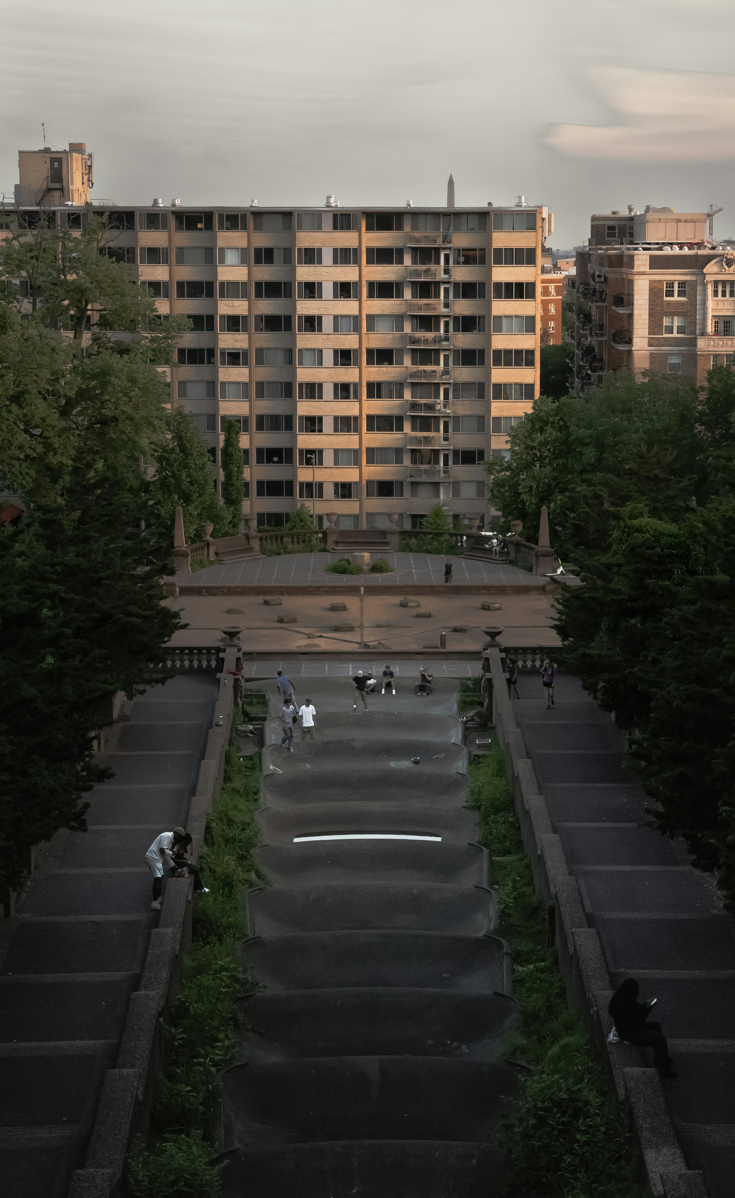 a view of a parking lot in front of a large building