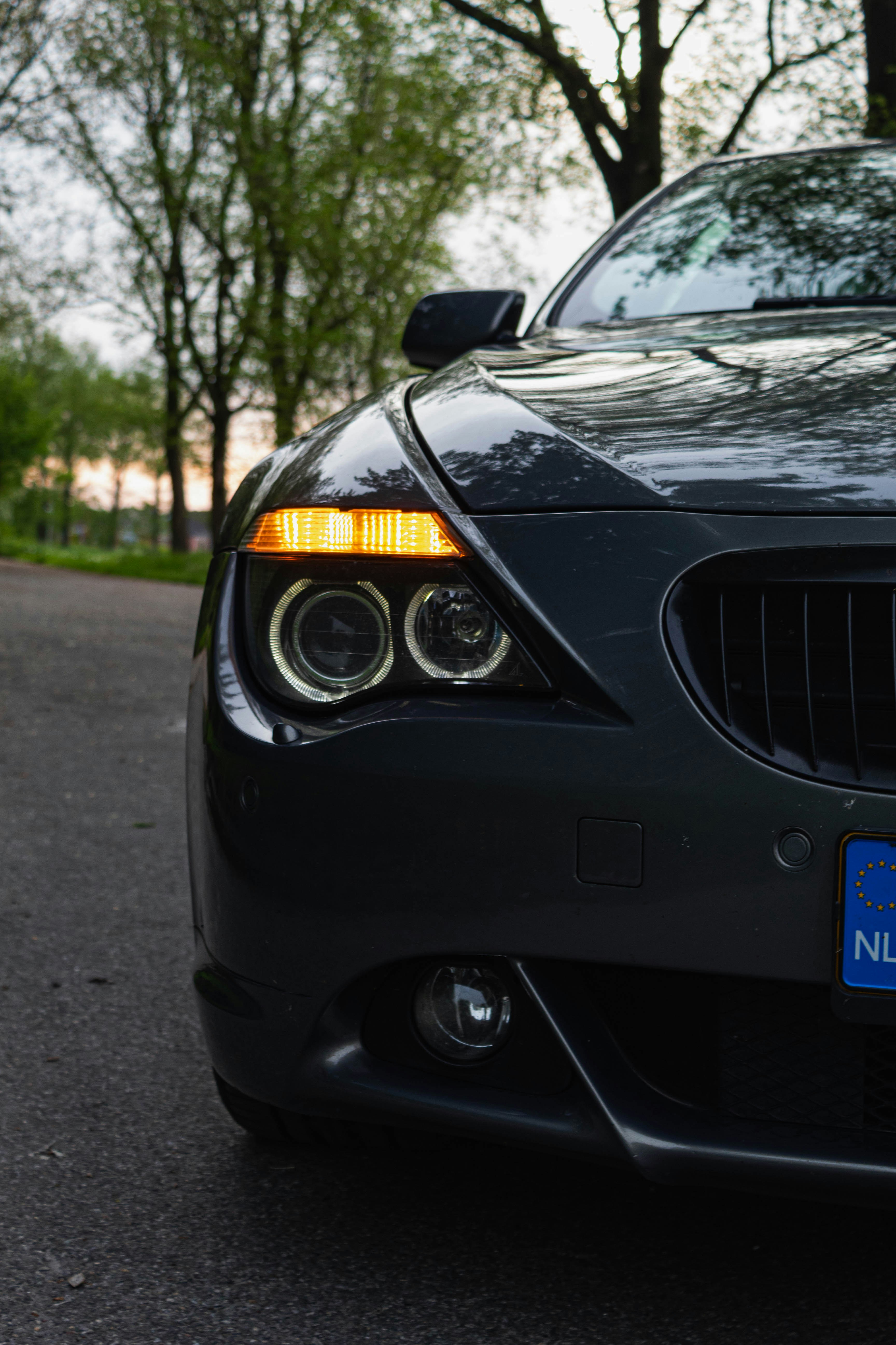 a close up of a car on a street