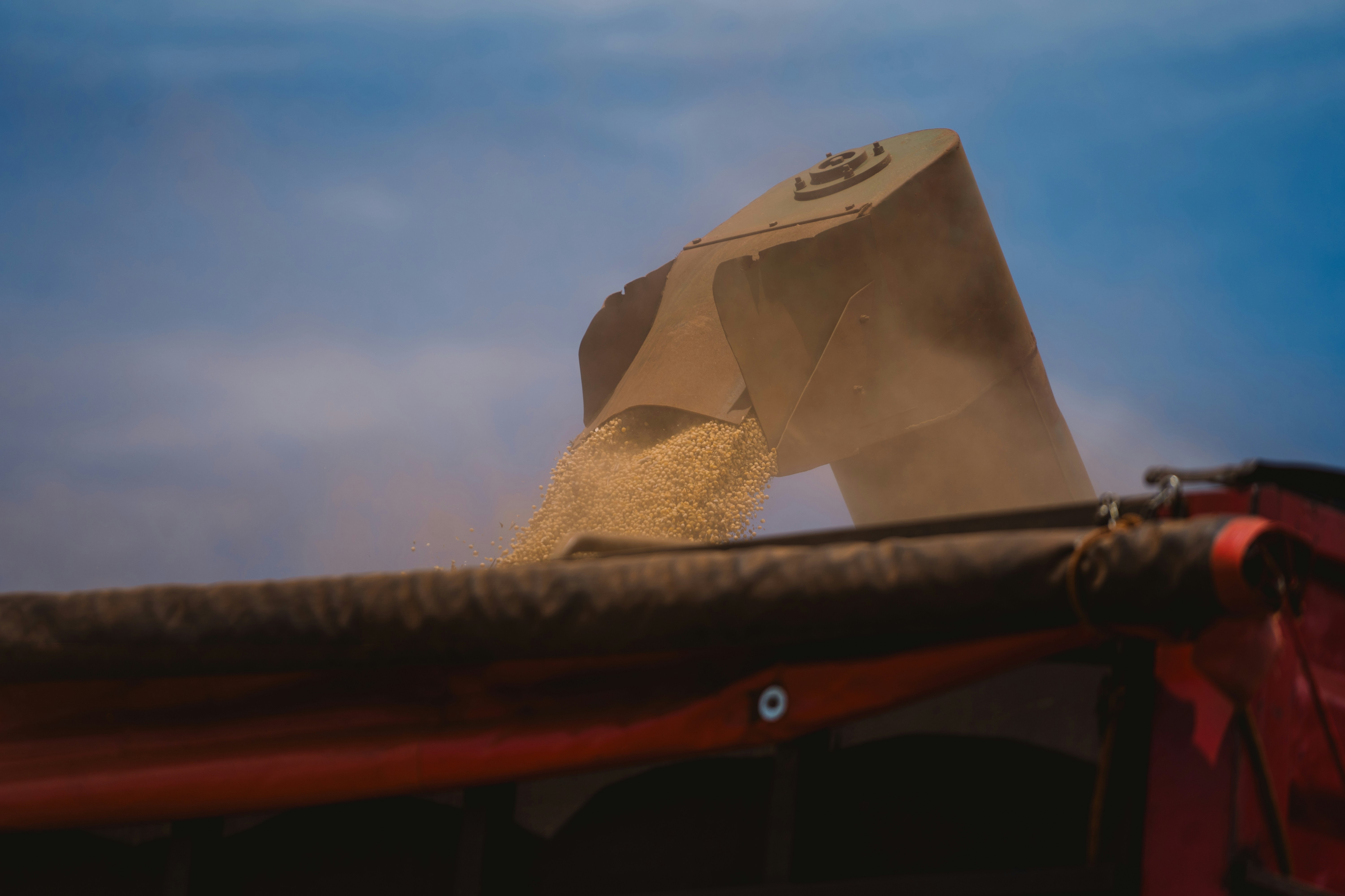 a red truck with a box on top of it