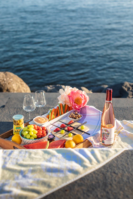 Beach picnic tray of food and wine at Vlychada, Santorini