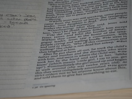 a close up of a book with writing on it