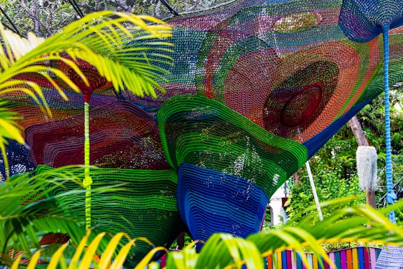 a group of colorful sculptures in a garden