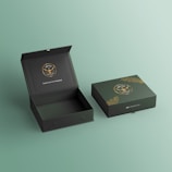 a black box with a gold emblem on it