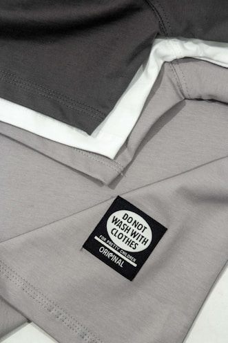 a close up of a shirt with a label on it