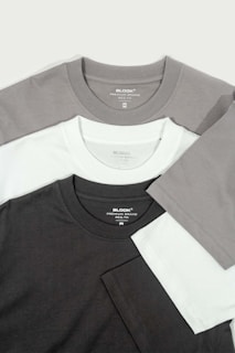 a group of three different colored t - shirts