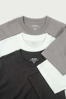 a group of three different colored t - shirts
