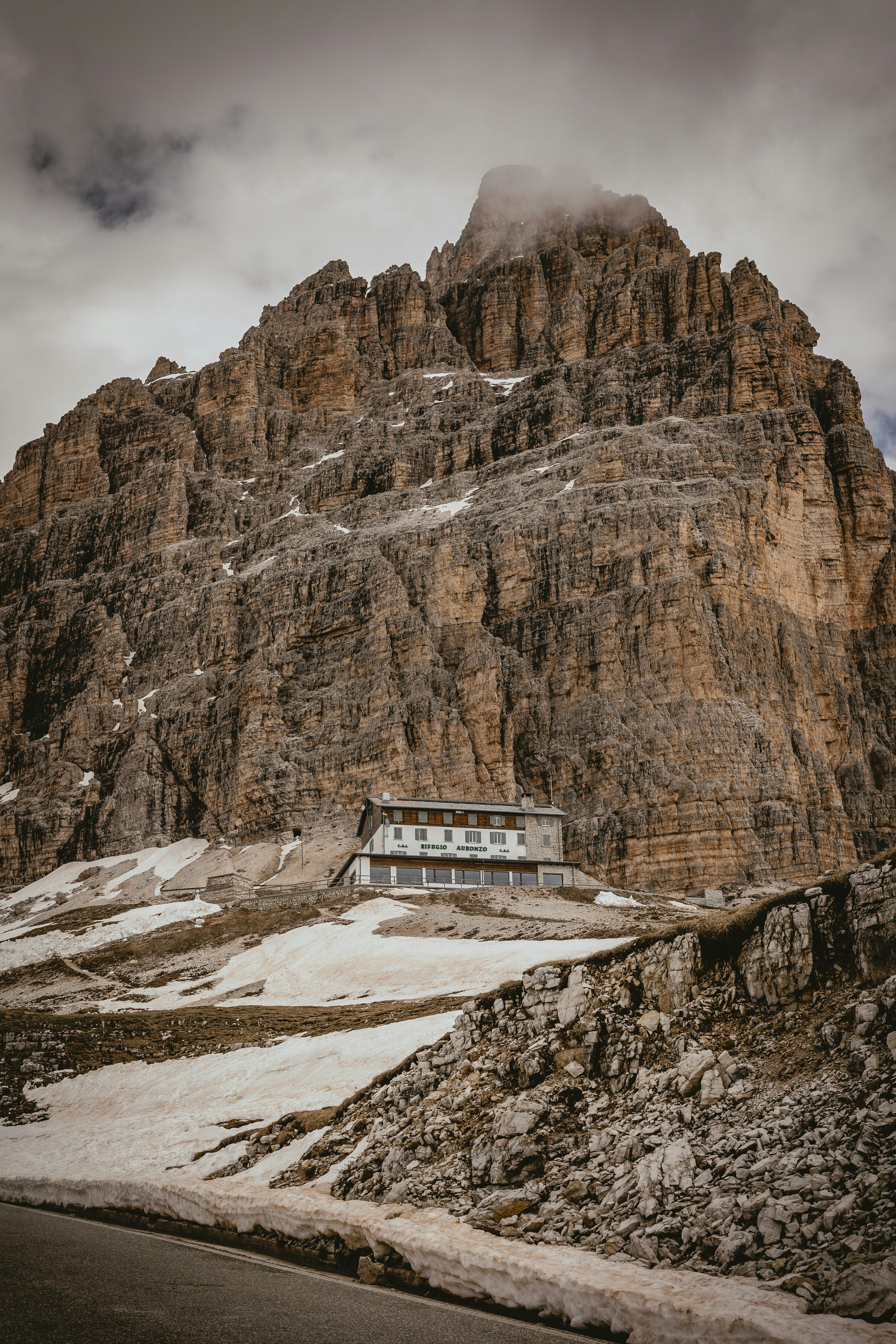 a mountain with a house on top of it