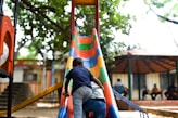 A couple of people that are on a slide