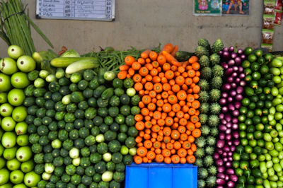 A large display of fruits and vegetables on display