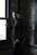 a man standing in front of a window