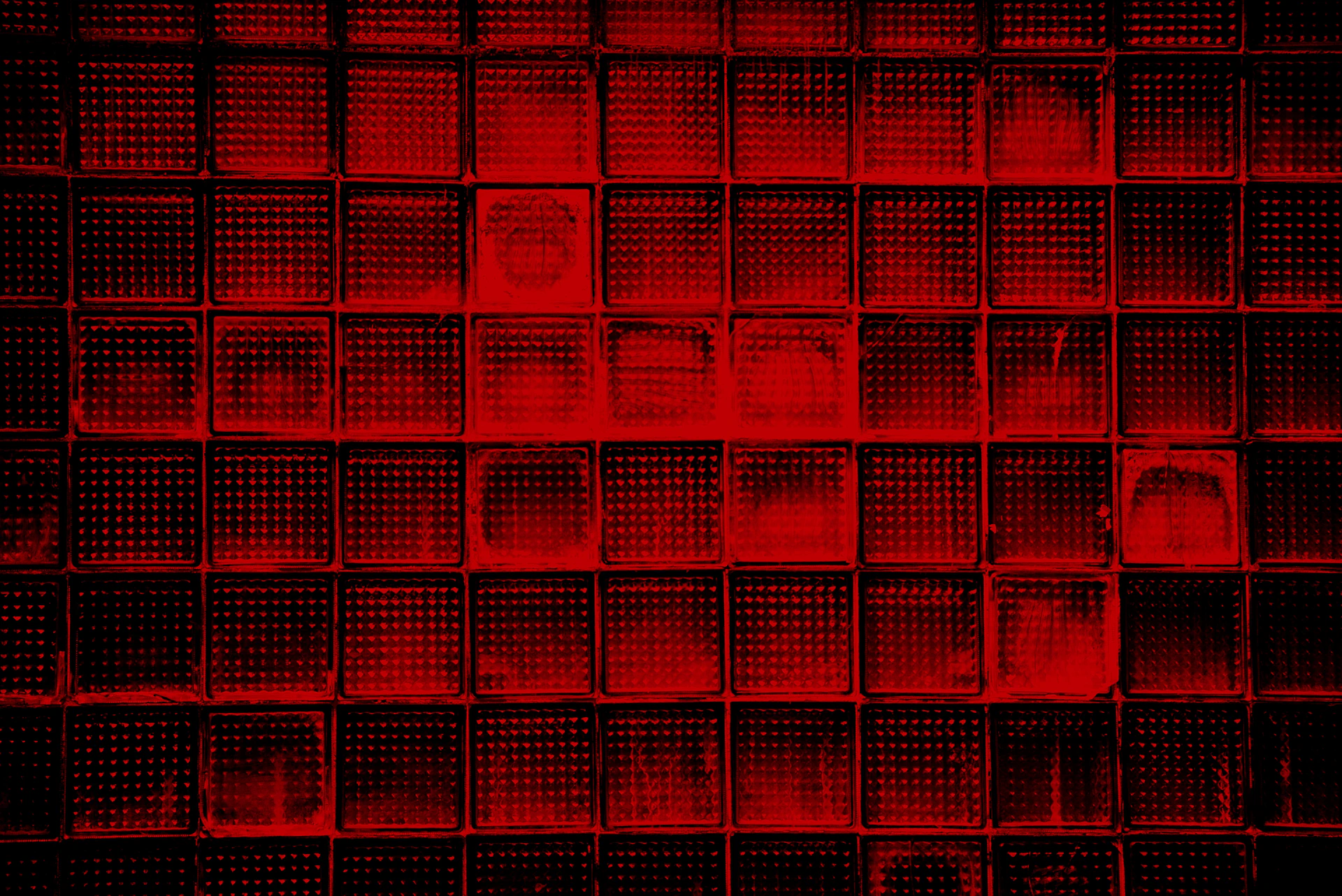 a red brick wall with lots of small squares