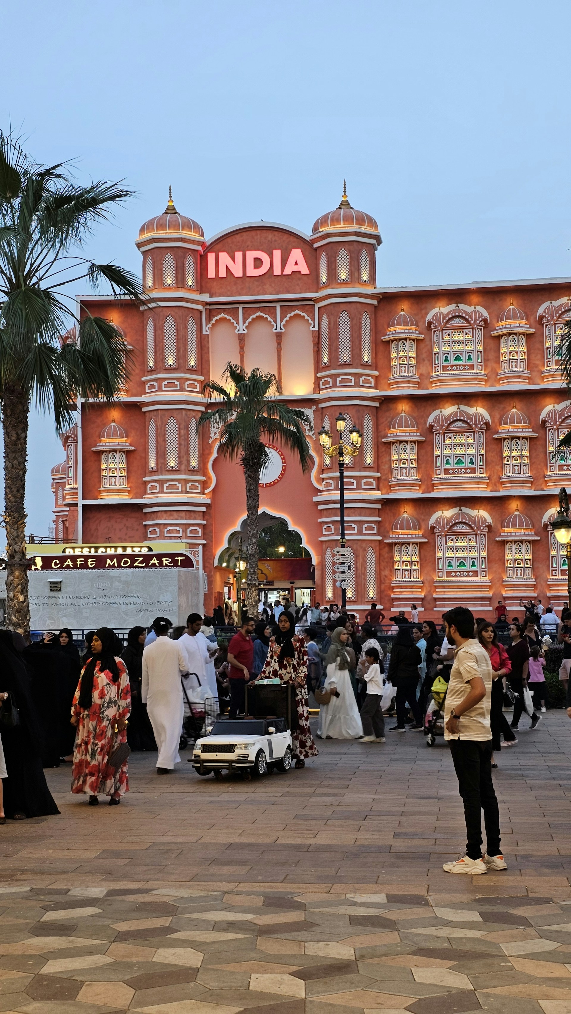 a group of people standing in front of a building