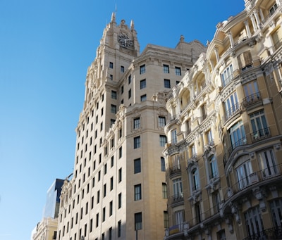 a tall building with a clock on the top of it