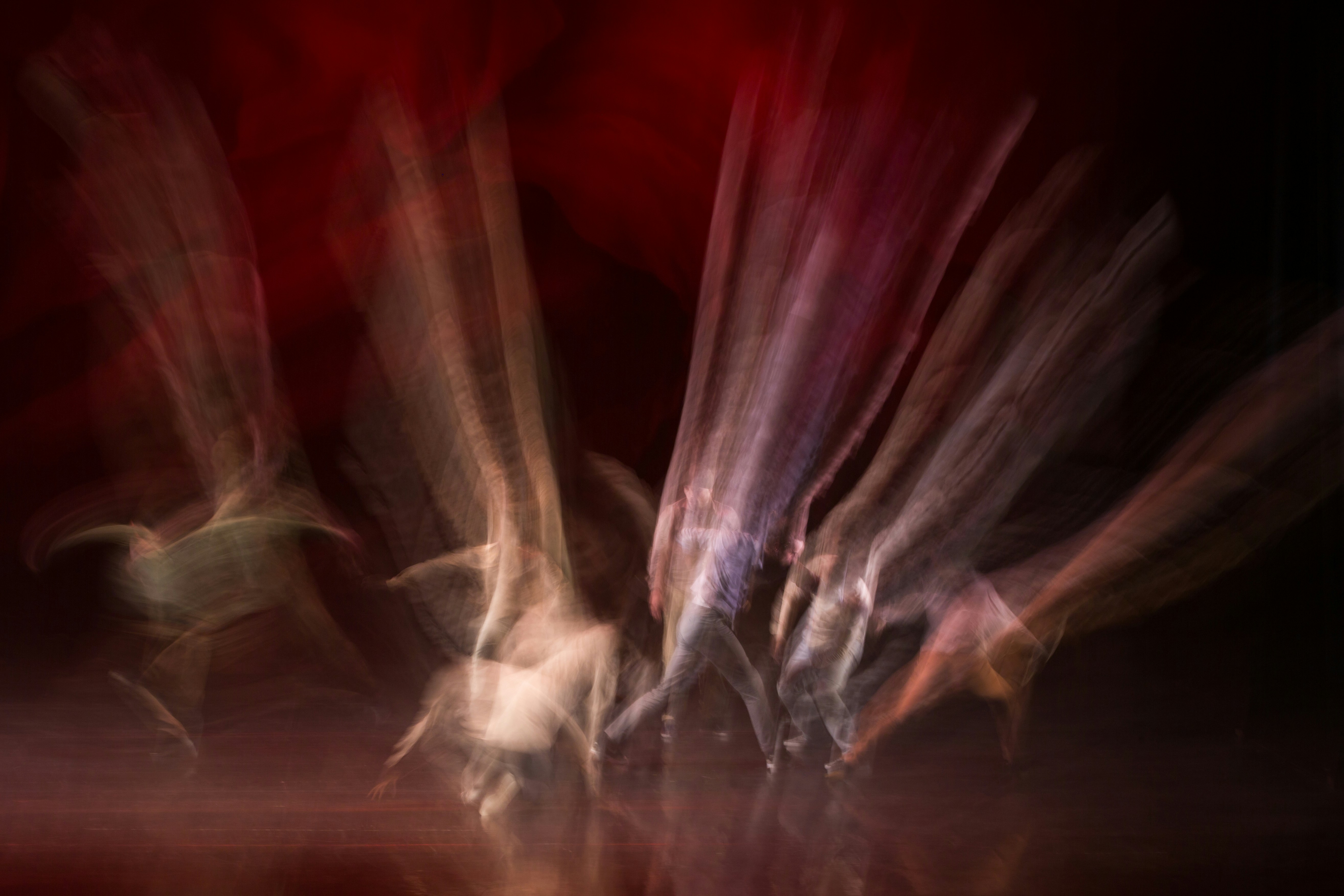 a blurry photo of a group of dancers