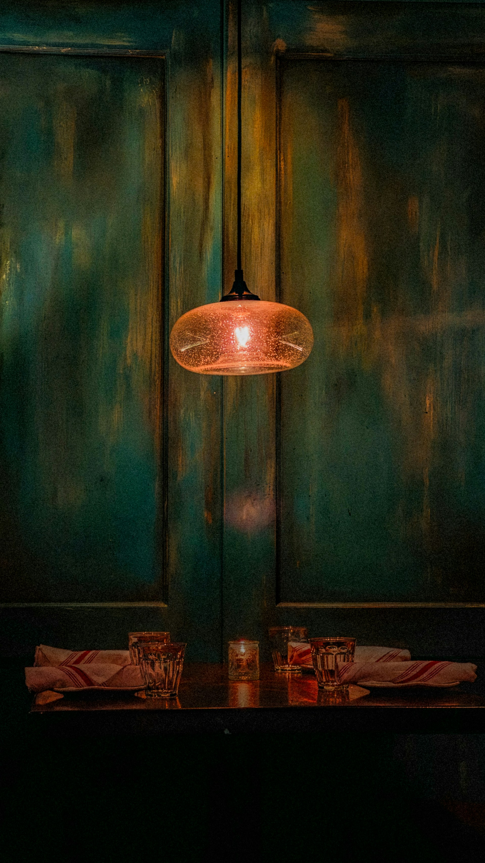 a table with a lamp on top of it