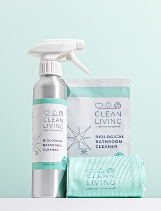a bottle of cleanser sitting on top of a counter
