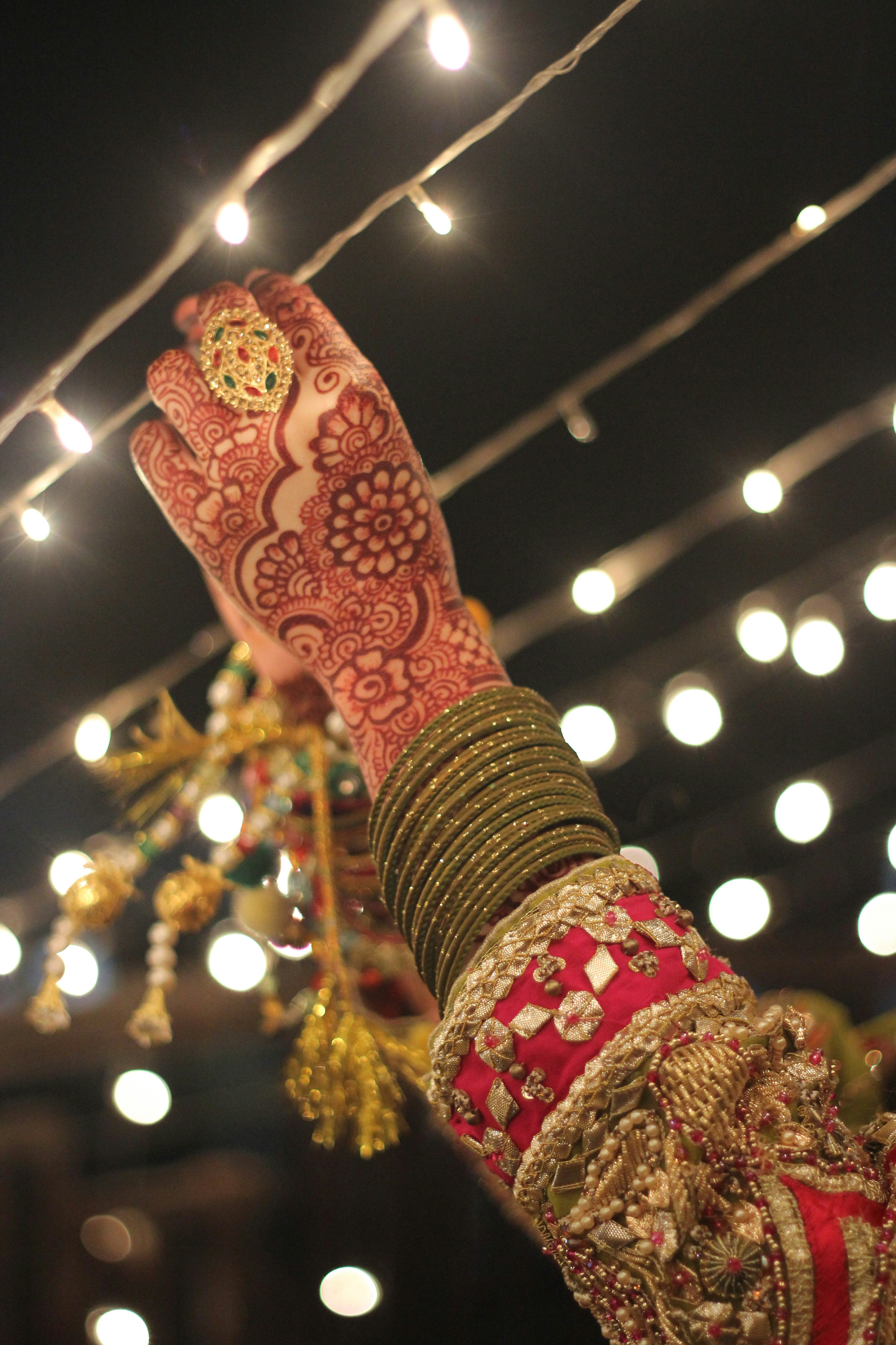 a woman's hand with henna on it