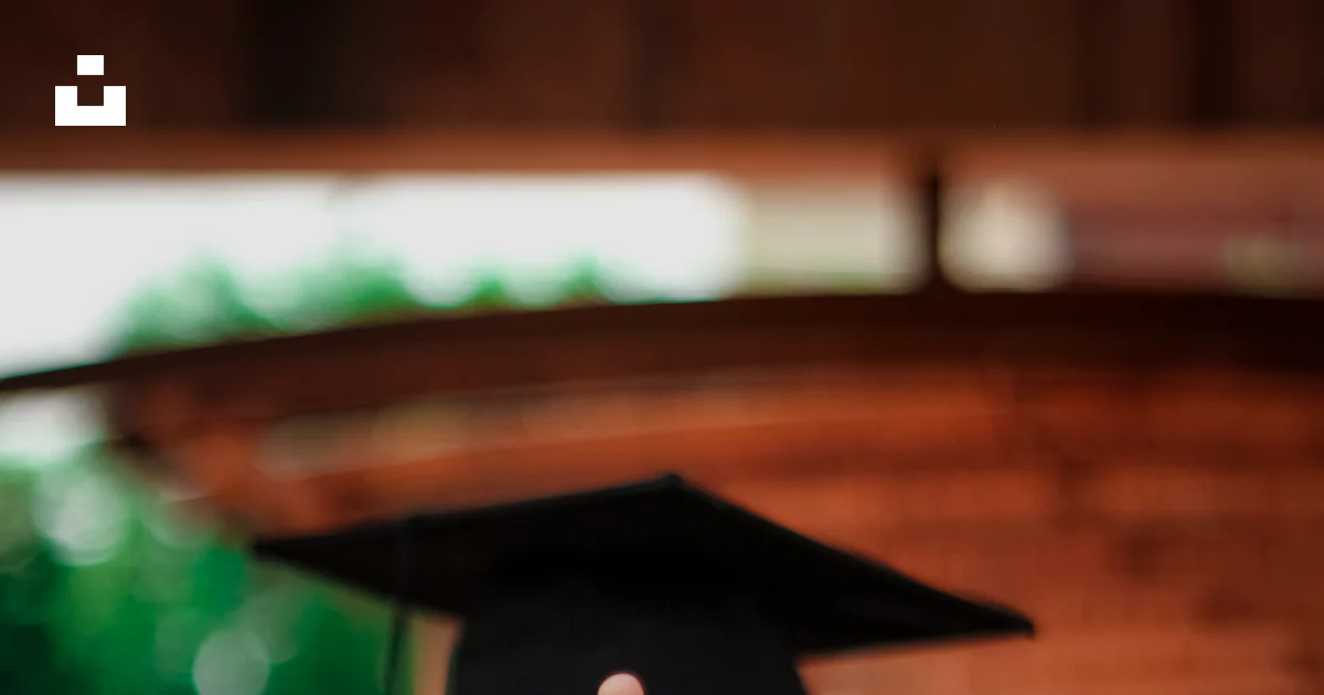 Peace Sign Graduation A woman in a graduation gown making a peace sign photo – Free Pakistani ...