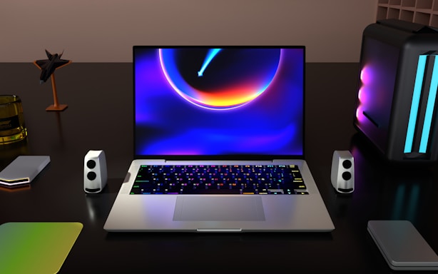 a laptop computer sitting on top of a desk