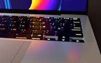 a close up of a laptop with a keyboard