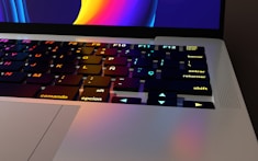 a close up of a laptop with a keyboard