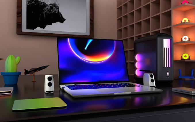 a laptop computer sitting on top of a desk