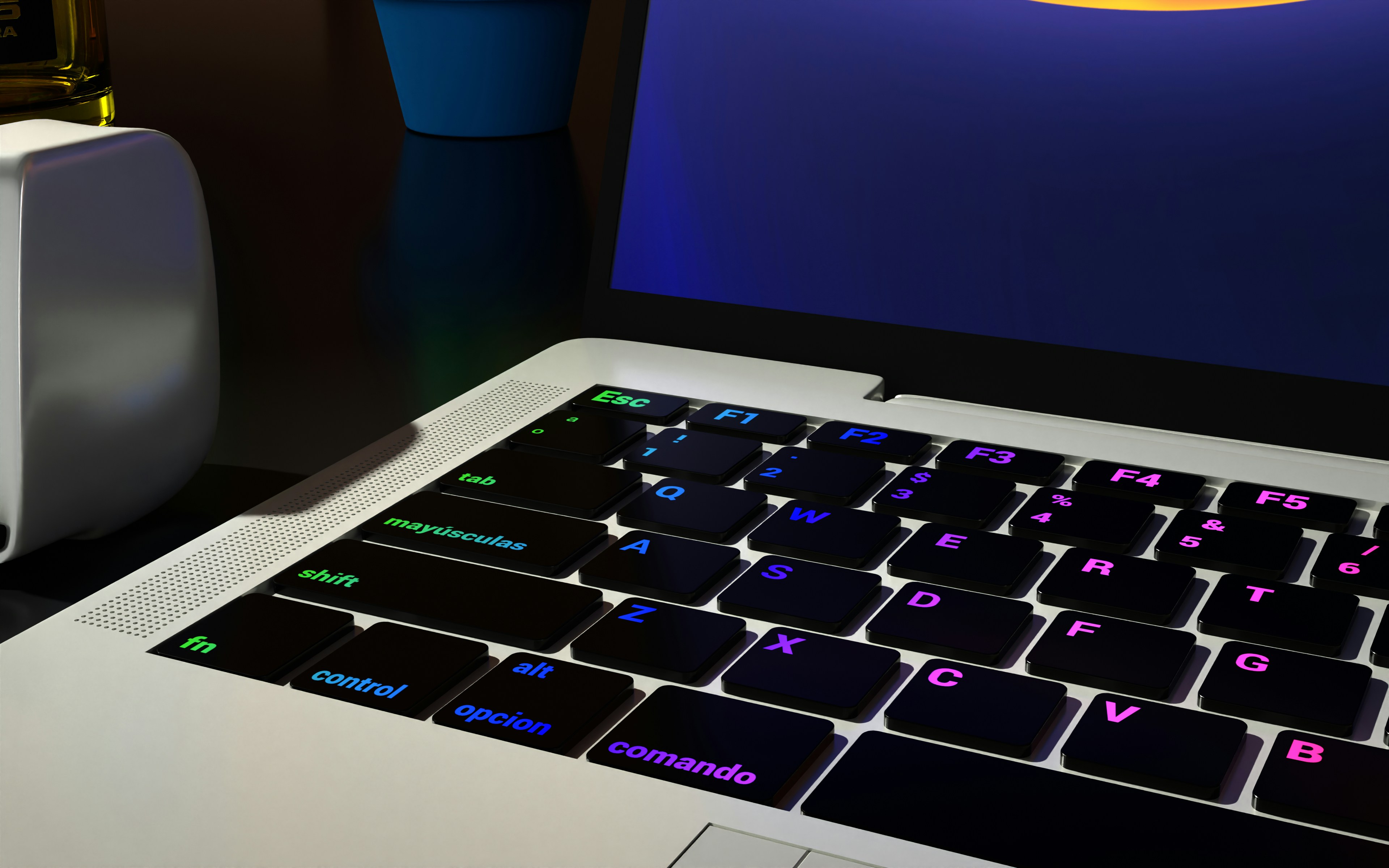 komputer laptop yang duduk di atas meja