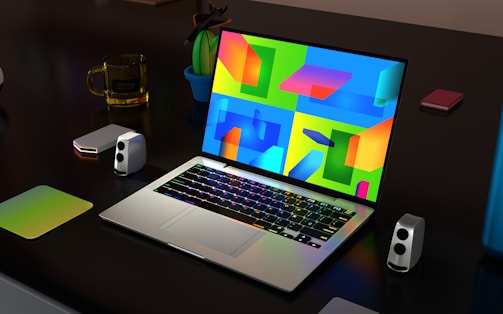 a laptop computer sitting on top of a desk