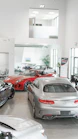 a car showroom filled with lots of cars