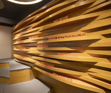 a room with a wooden wall and a bench