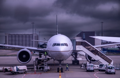 a large jetliner sitting on top of an airport tarmac