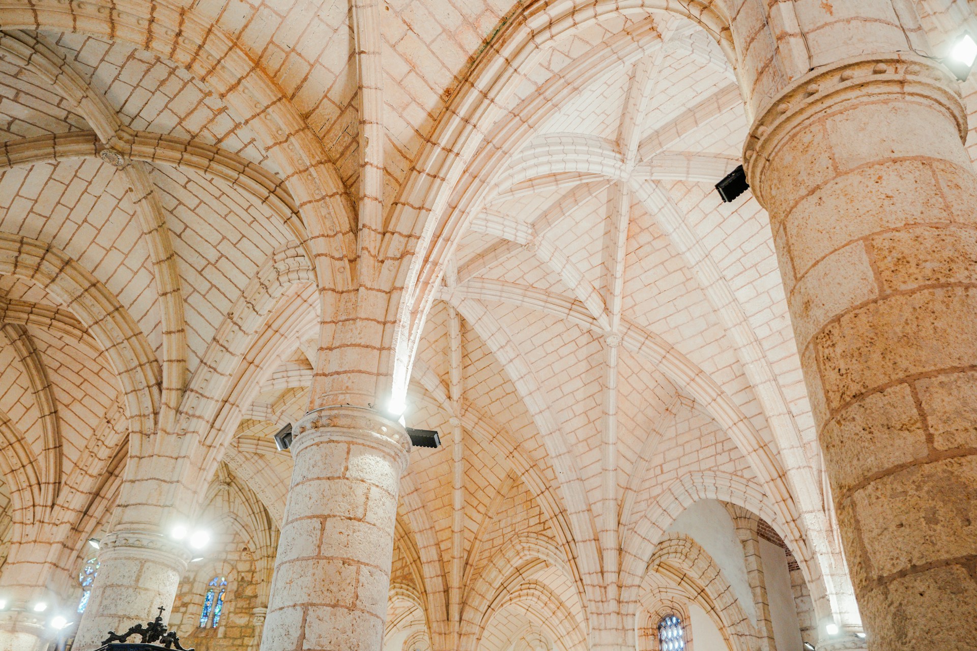 the interior of a large cathedral with high vaulted ceilings