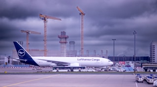 a large jetliner sitting on top of an airport tarmac