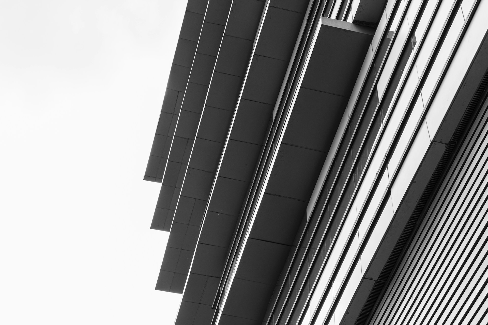 a black and white photo of a tall building