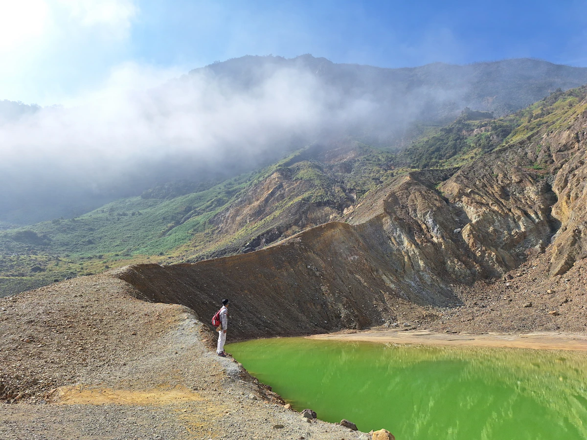 Volcanic summit and Segara Anak crater lake along the Mount Rinjani trail