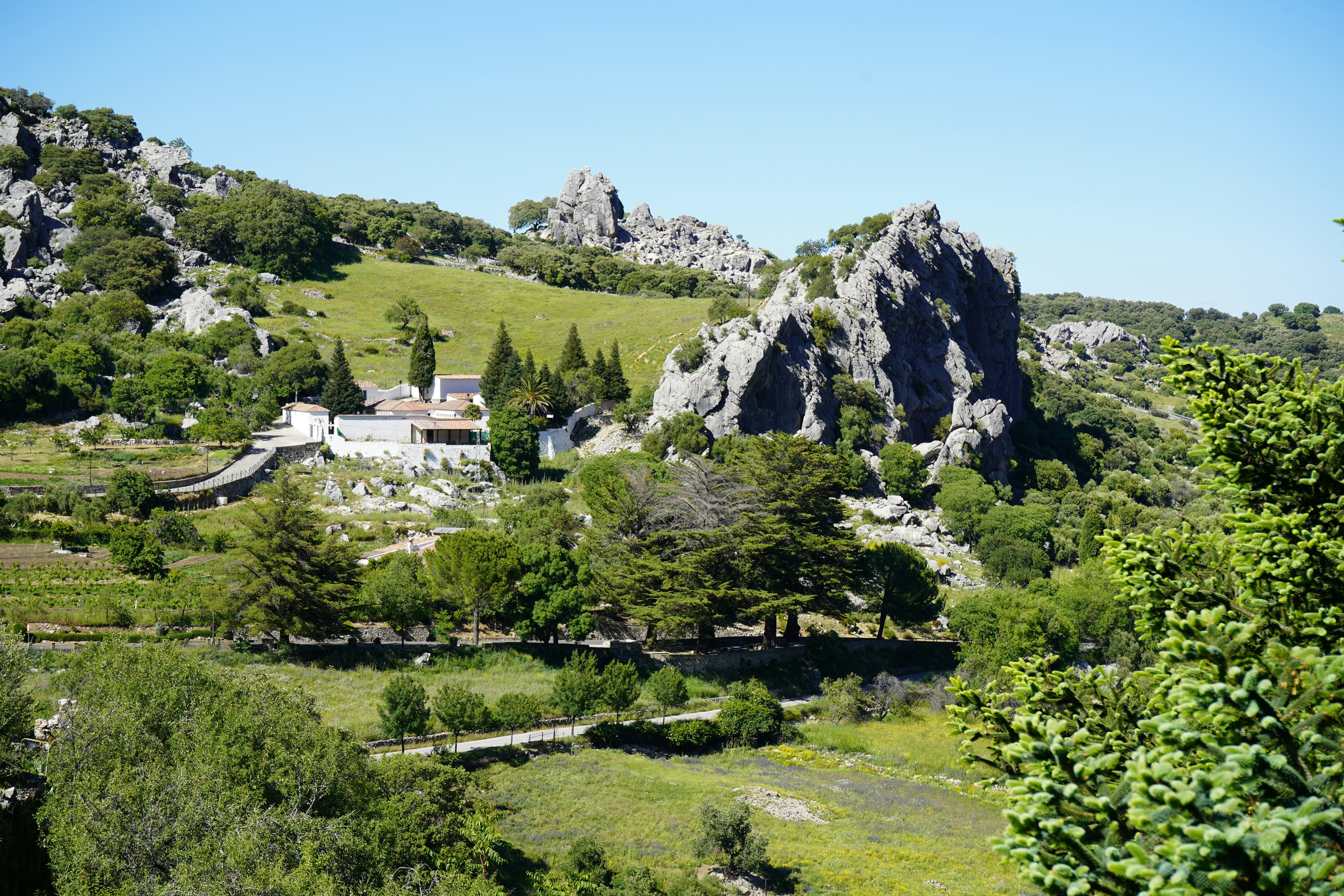 a mountain with a house on top of it