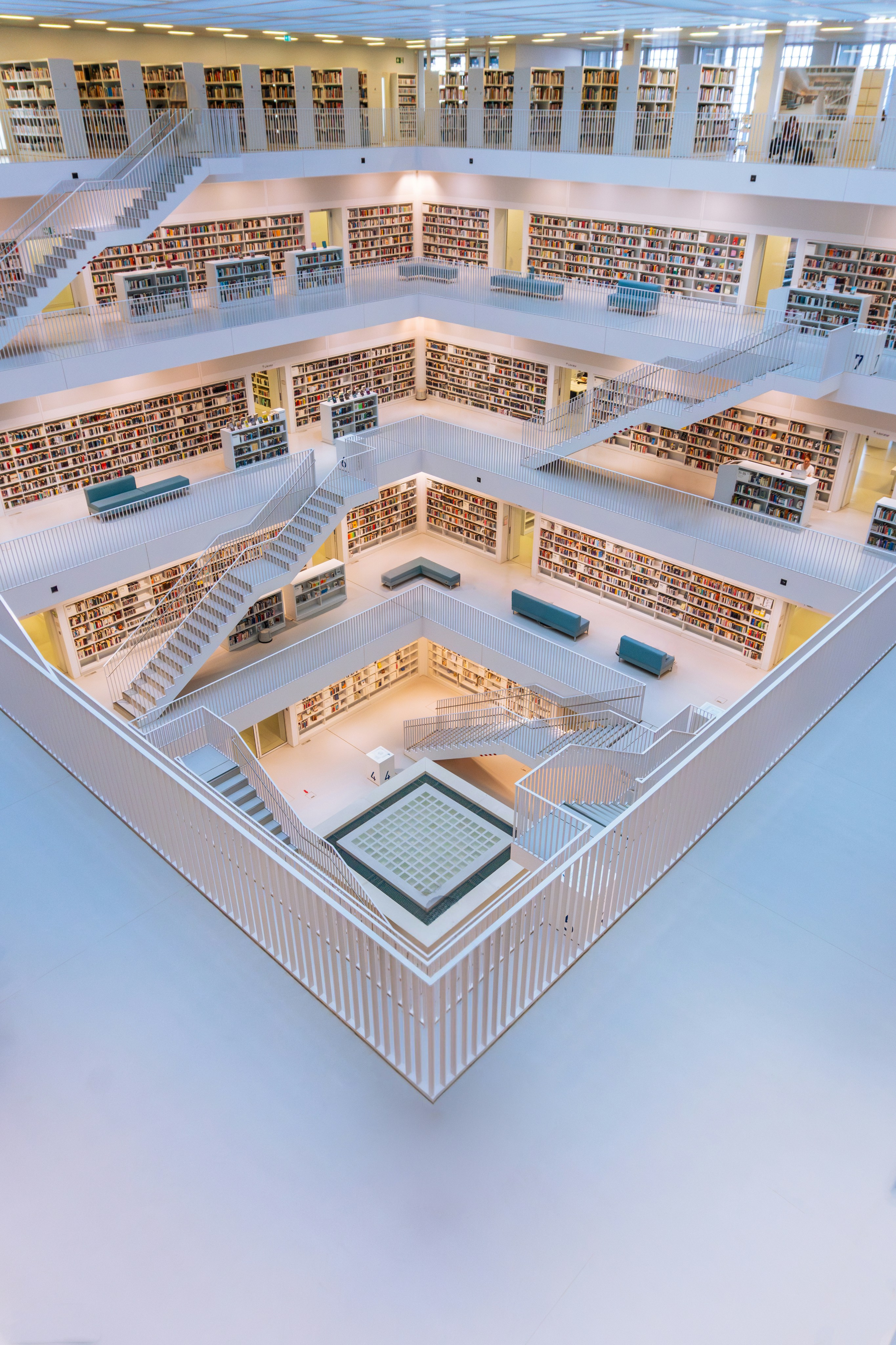 an aerial view of a large library with many bookshelves