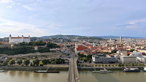 The old town and the UFO bridge across the Danube — Bratislava, Slovakia