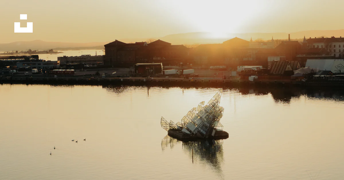 A large object floating on top of a body of water photo – Free Oslo ...