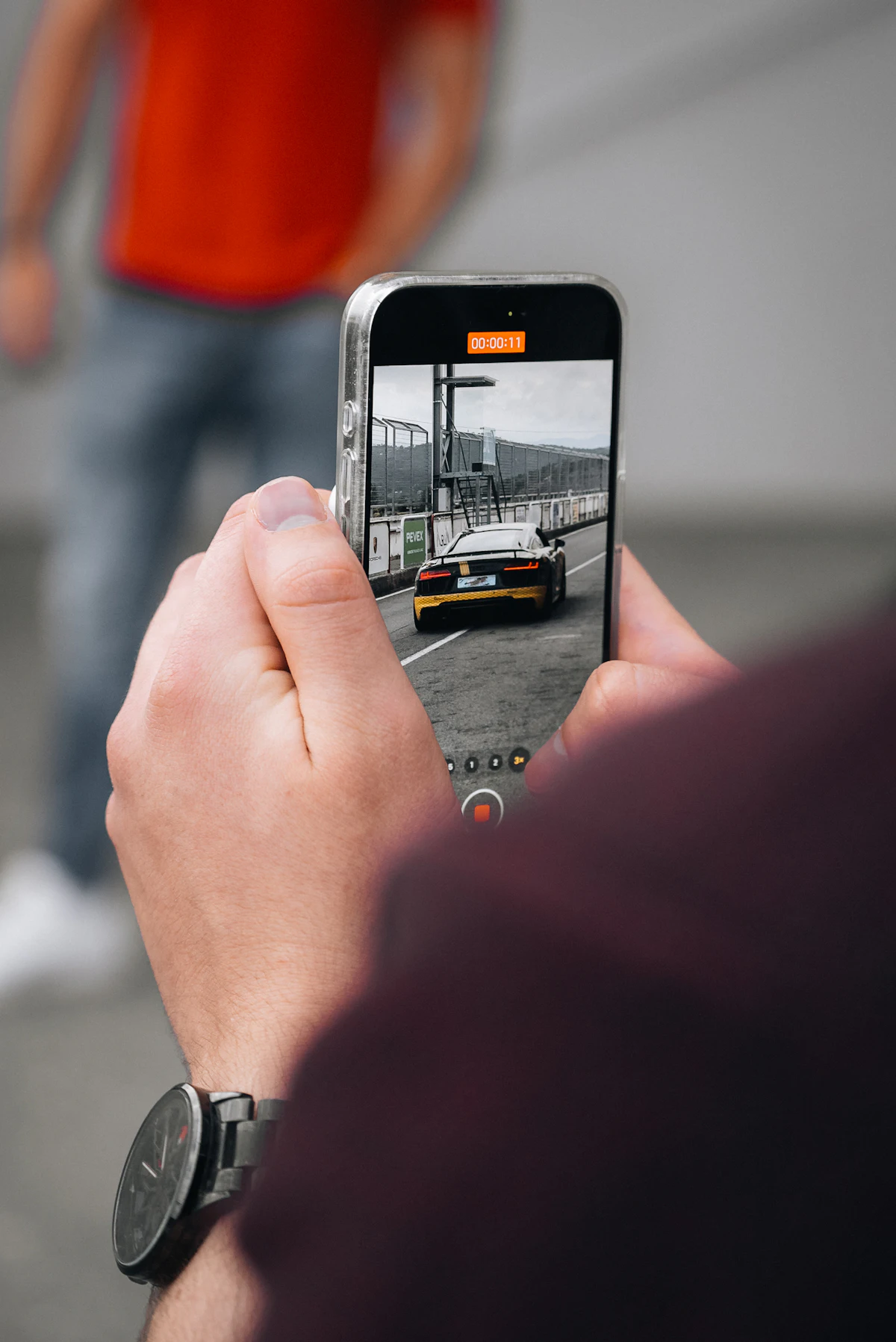 Customer photographing their car with a phone