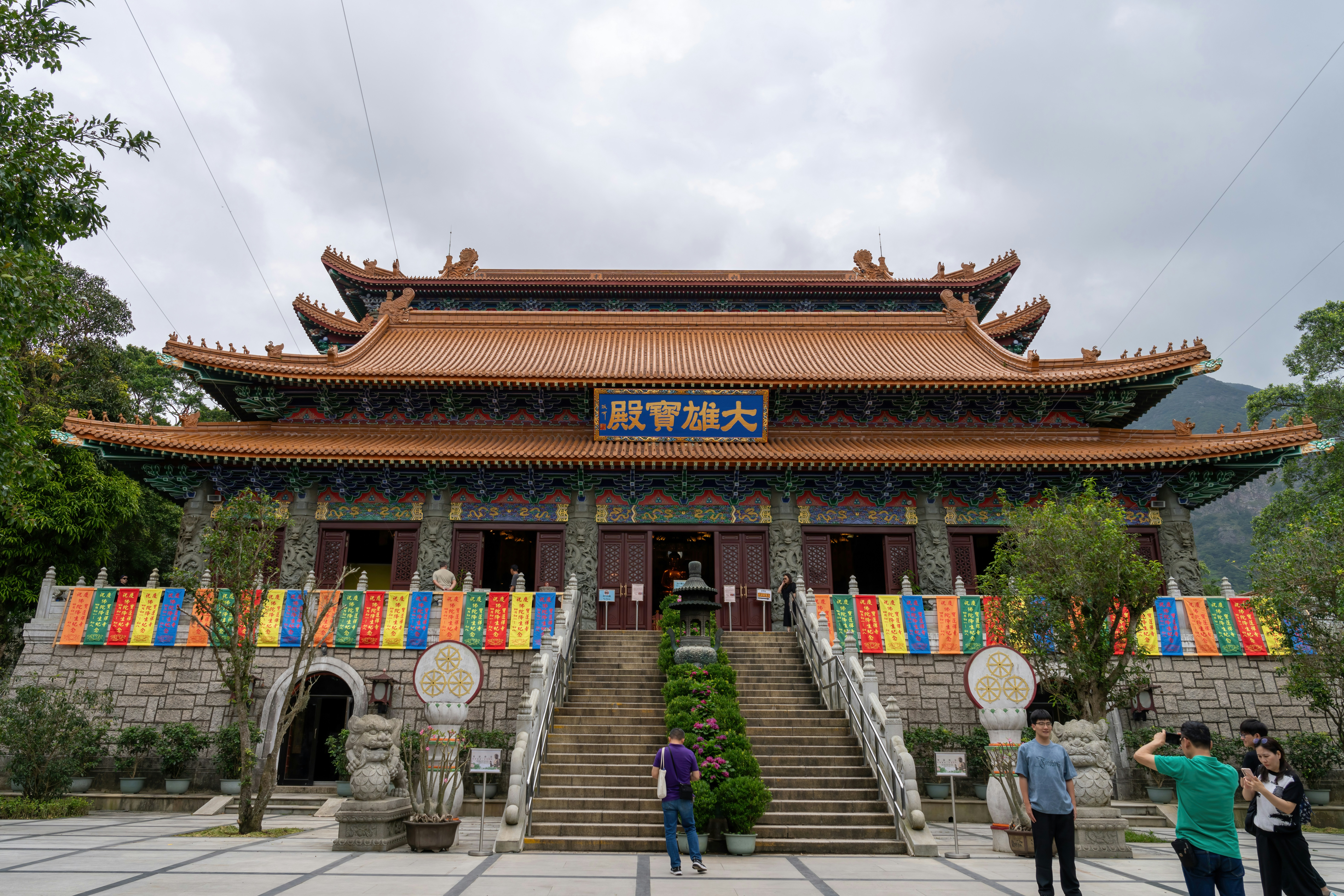 a group of people standing in front of a building