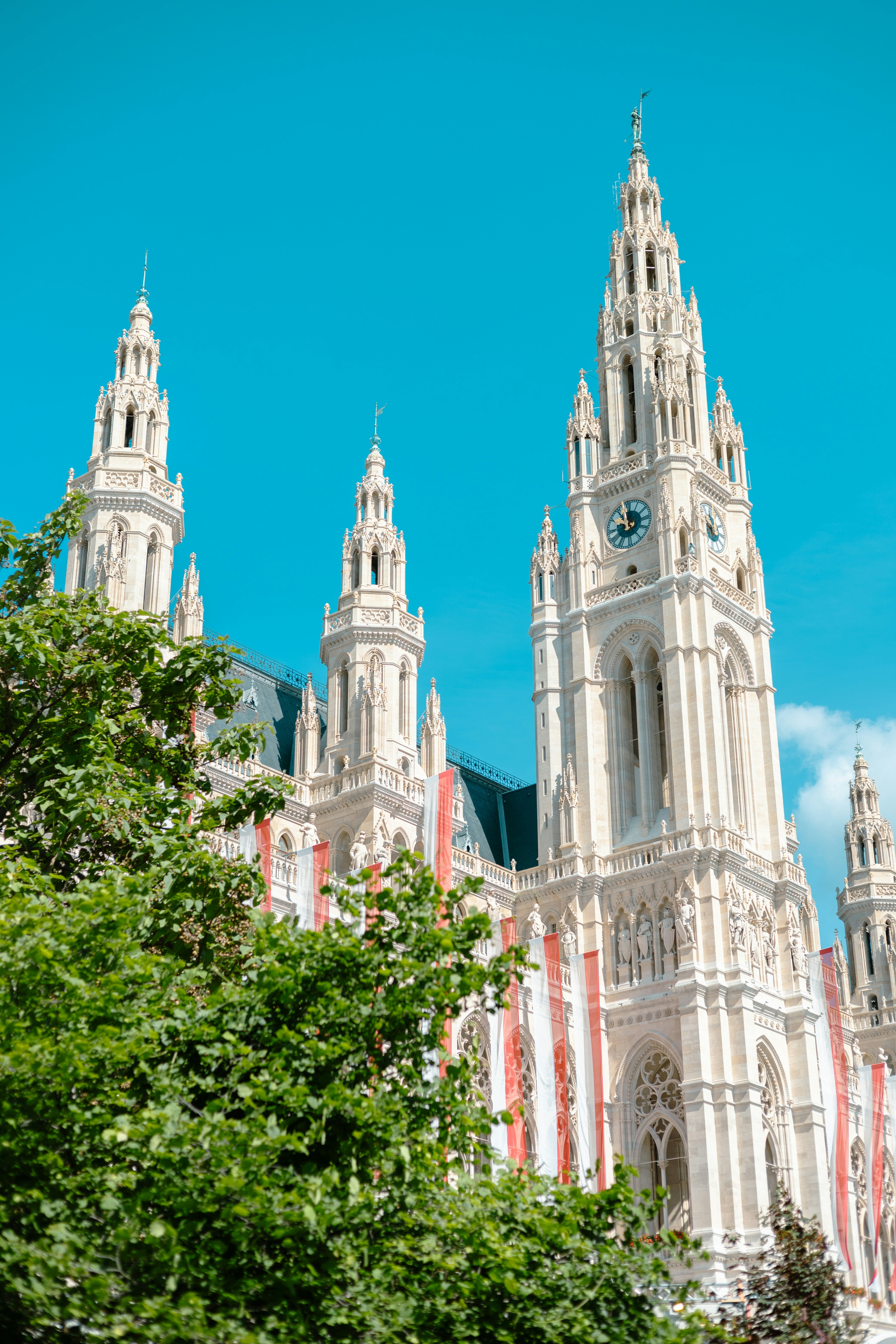 a very tall building with a clock on it's side