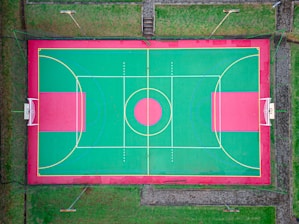 an overhead view of a basketball court in a park