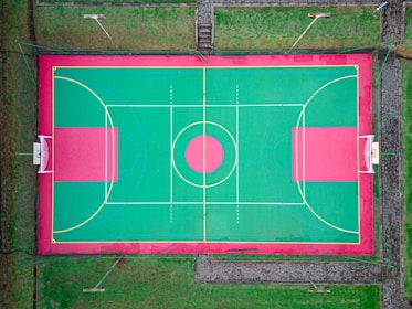 an overhead view of a basketball court in a park